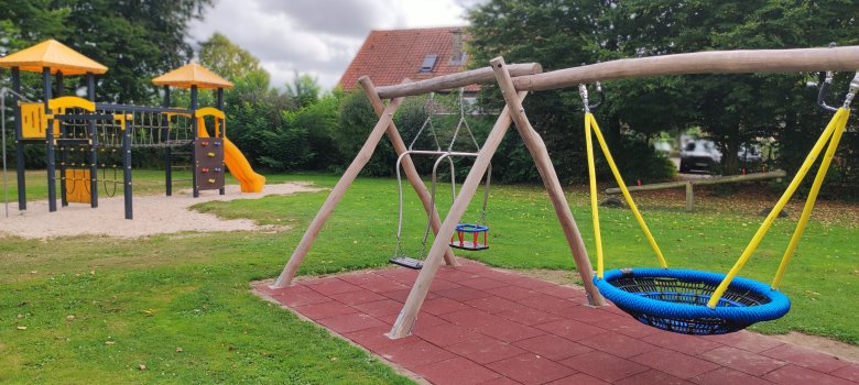 Swings and climbing frame on a playground